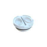 White plastic component on a gray surface